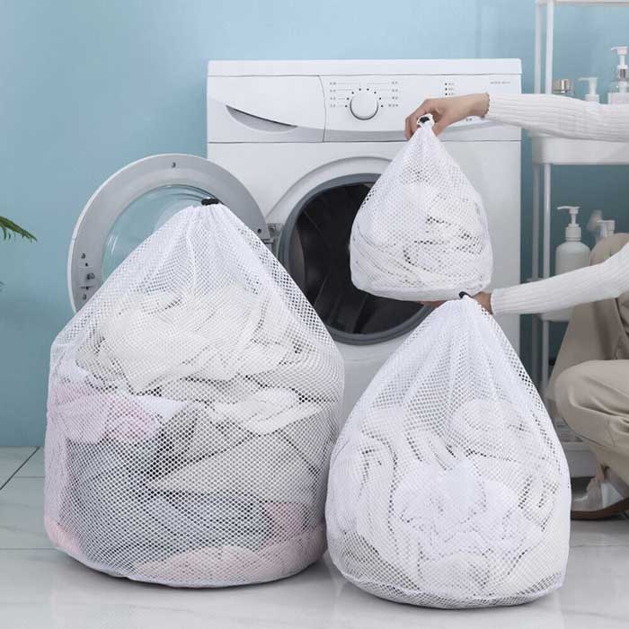 Quần áo dồn không đều hoặc vượt quá tải trọng Quần áo dồn không đều hoặc vượt quá tải trọng